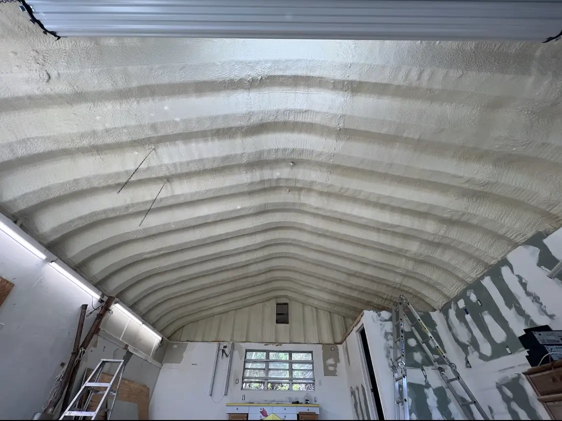 Spray polyurethane foam applied to the underside of a metal roof deck in Thurmont